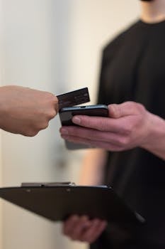 A contactless payment transaction using a smartphone scanner in an indoor setting.