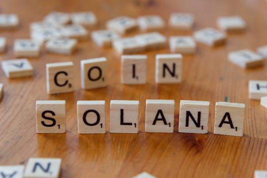 Scrabble tiles creatively arranged to spell 'Solana Coin', highlighting cryptocurrency concept.